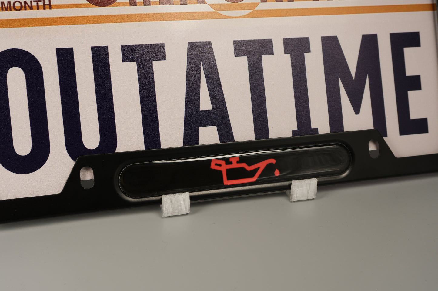 License plate frame aluminum CEL - LOW OIL