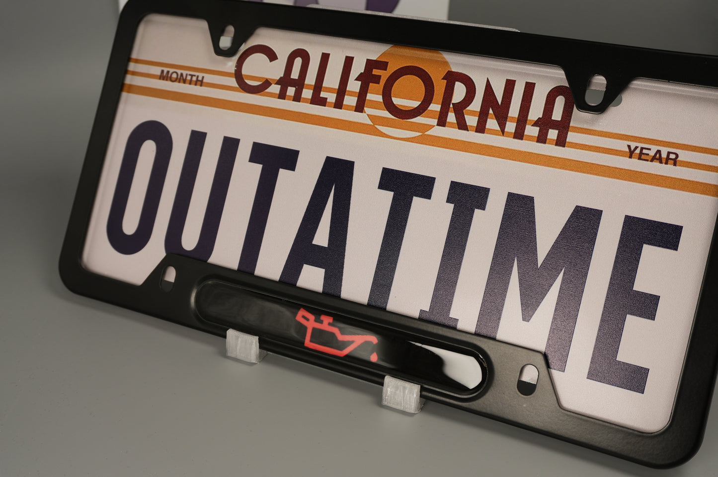 License plate frame aluminum CEL - LOW OIL