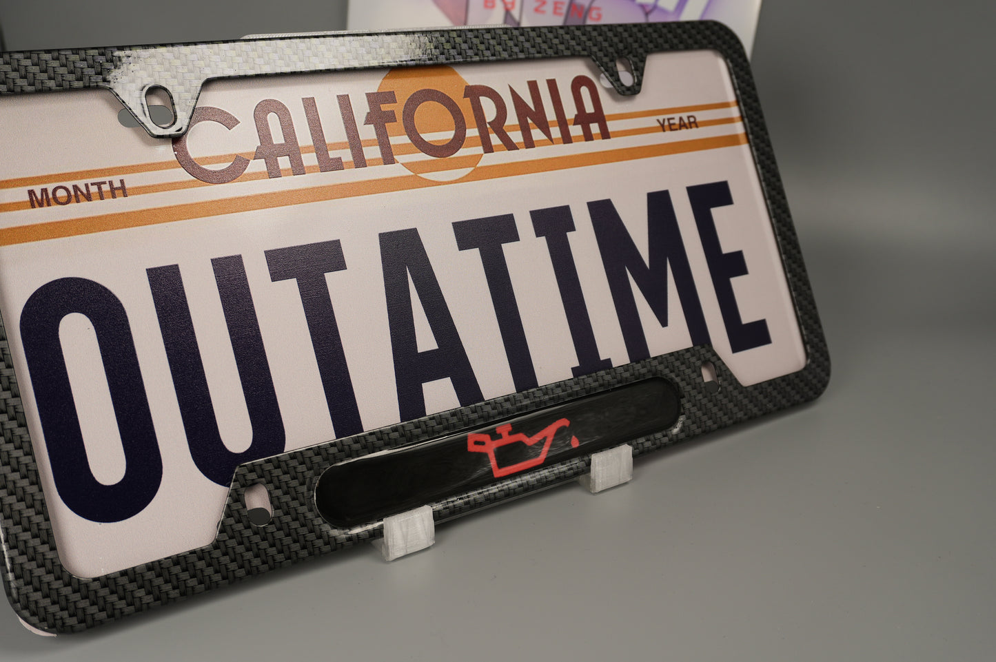 License plate frame aluminum CEL - LOW OIL