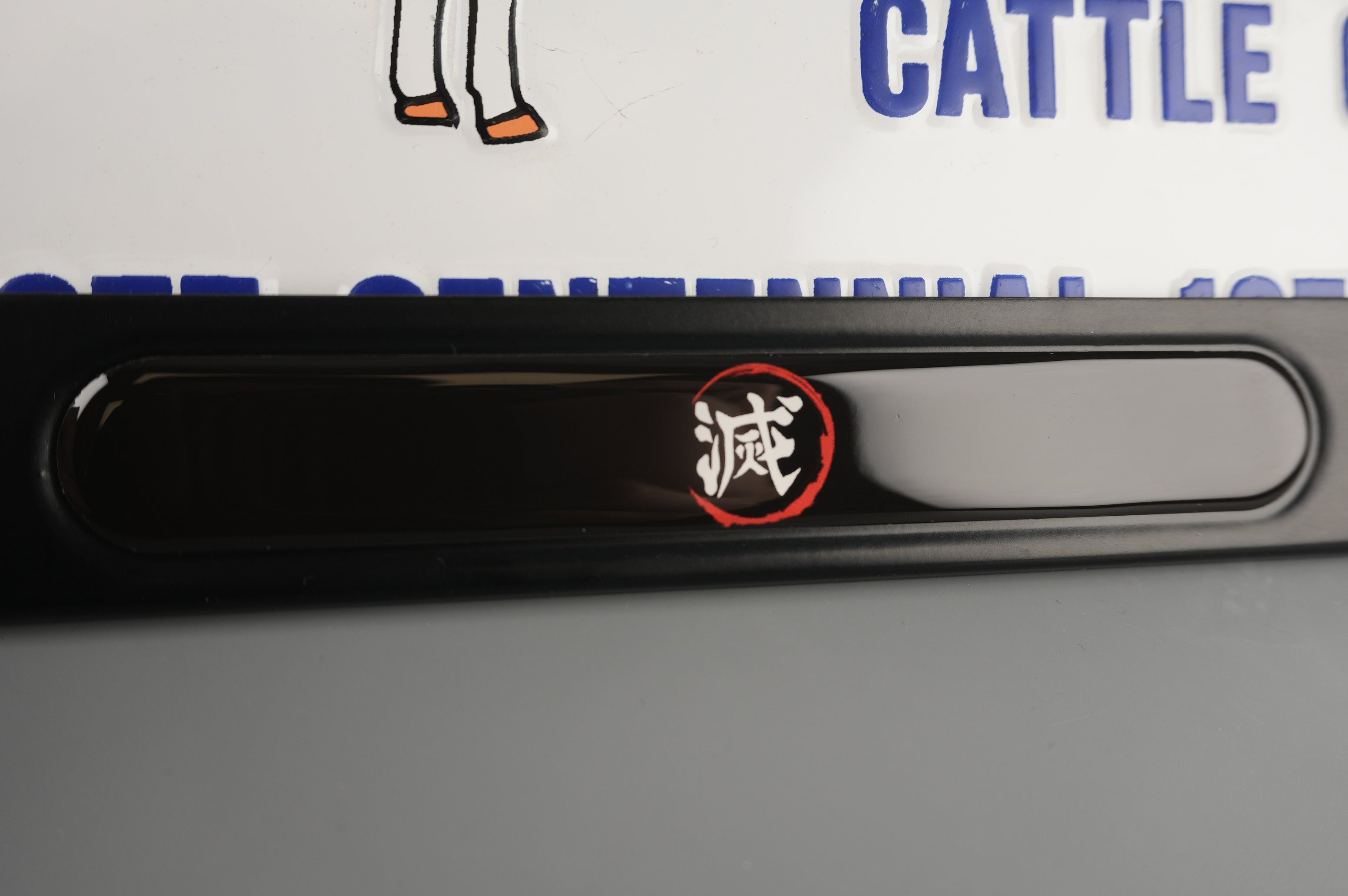 License Plate Frame team 滅 which means “to obliterate”